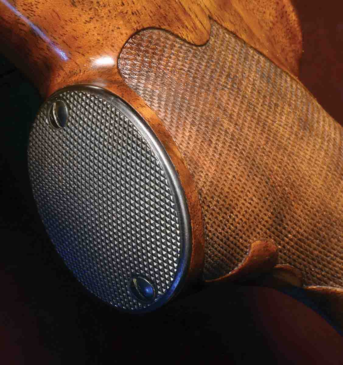 The grip cap is knurled steel in the style made popular by Alvin Linden’s metal-working colleague Emil Koshollek and complements the checkering beautifully.